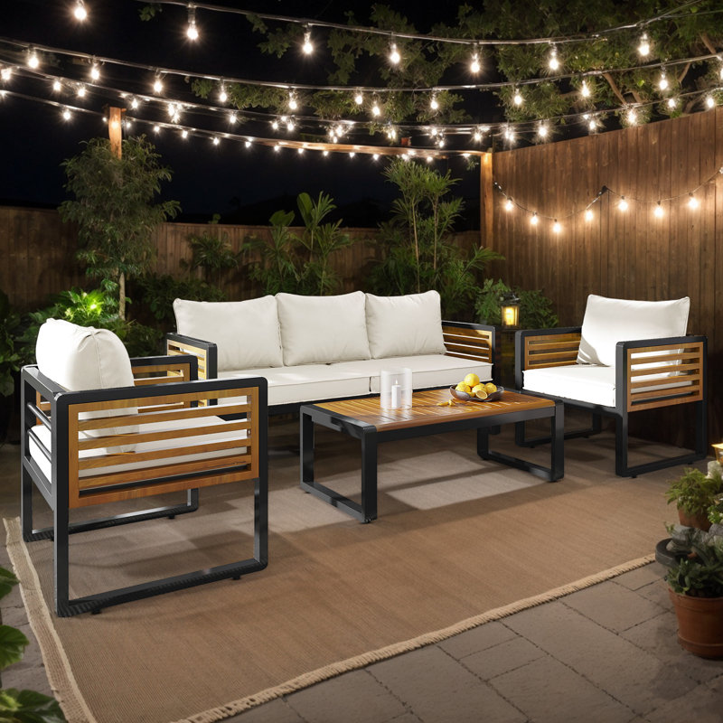 Ensemble de conversation de patio Abdel Outdoor pour 5 personnes en acacia avec coussin amovible, structure en métal noir et bois