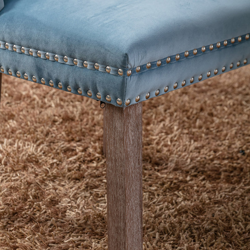 Chaise de salle à manger rembourrée en velours de bois massif haut de gamme avec garniture cloutée