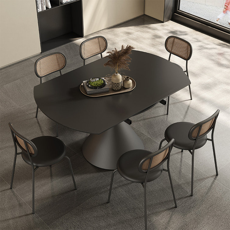 https://assets.wfcdn.com/im/43450092/resize-h755-w755%5Ecompr-r85/2505/250521703/Modern+Simple+Round+Black+Rock+Plate+Dining+Table+7+-+Piece+Extendable+Pedestal+Dining+Set.jpg