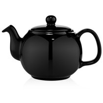 Modern teapot design. Black & white ceramic. A tribute to Eva Zeisel.