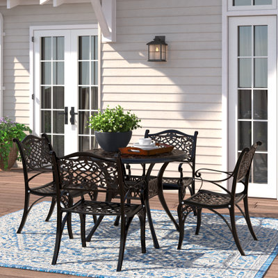 Amber-Jo 4 - Person Patio Dining Set Umbrella Hole Included Round Table