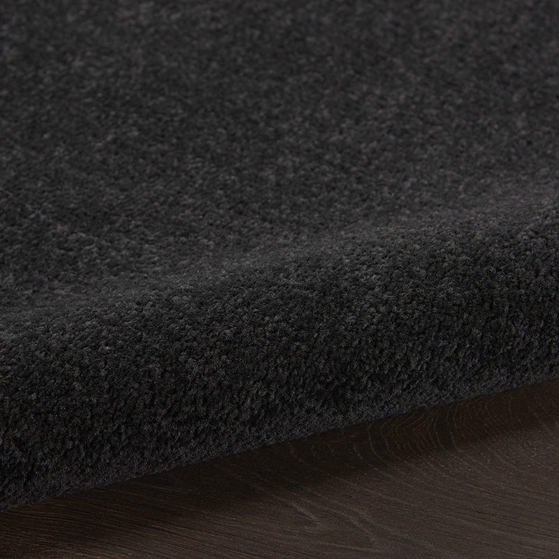 Tapis intérieur / extérieur noir uni en polypropylène tissé à la machine 8 pi x 10 pi