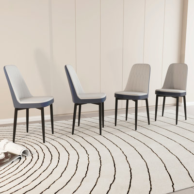 Un ensemble de 4 chaises de salle à manger, de style moderne, fabriquées en similicuir de haute qualité avec des coussins moelleux épais, une chaise de cuisine à pieds en métal et une chaise de salle à manger