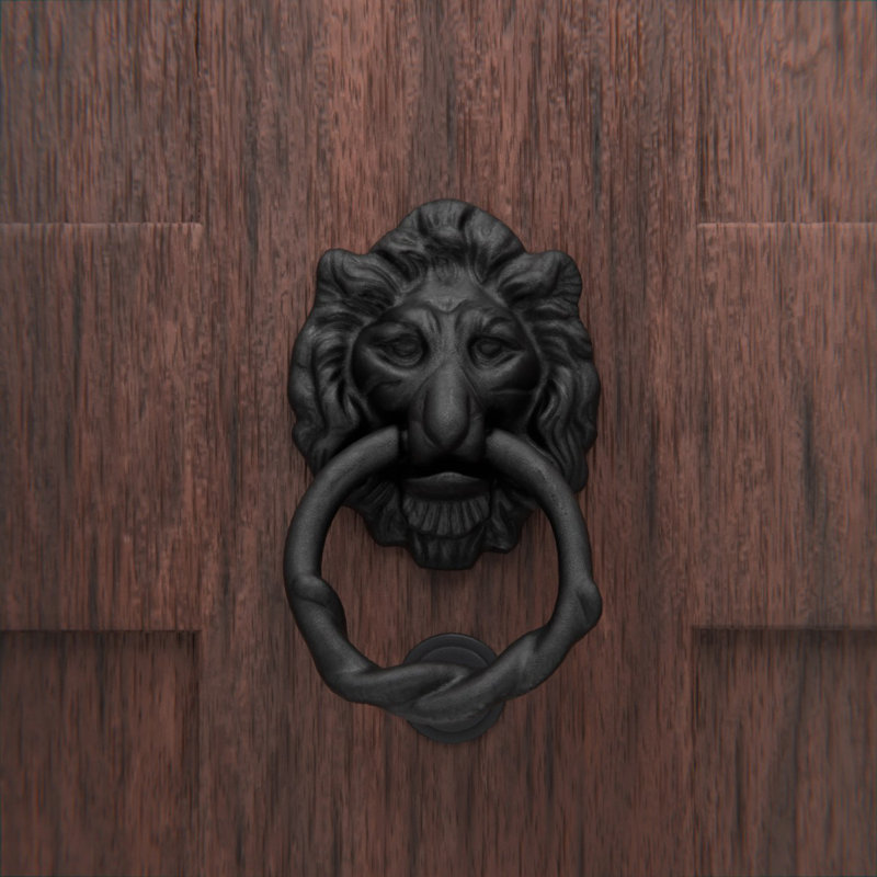 Porte-pièces de lion en fonte