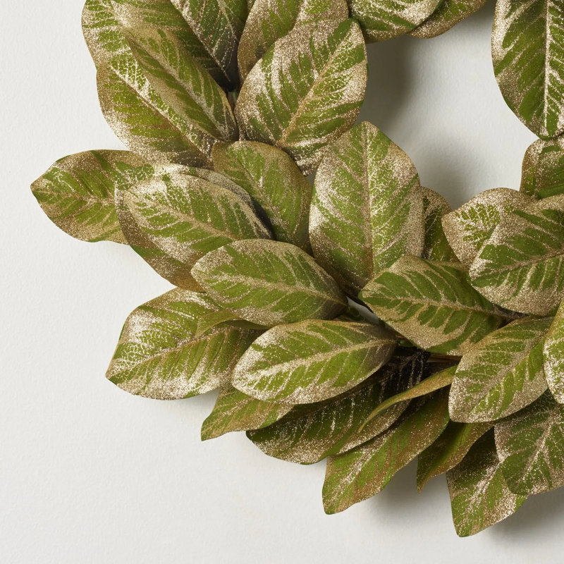 Cadre de cheminée de Noël vert et doré à motif de feuille de magnolia