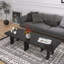 Table basse gigogne contemporaine en sapin noir, extensible jusqu'à 180 cm (70,86 po), idéale pour le salon principal, gain de place et polyvalente, centre de pièce moderne, surface lisse.