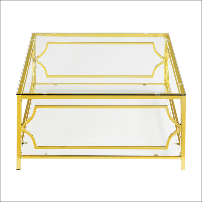 Table basse carrée en verre avec structure luxueuse en métal géométrique, finition dorée et tablette inférieure fonctionnelle