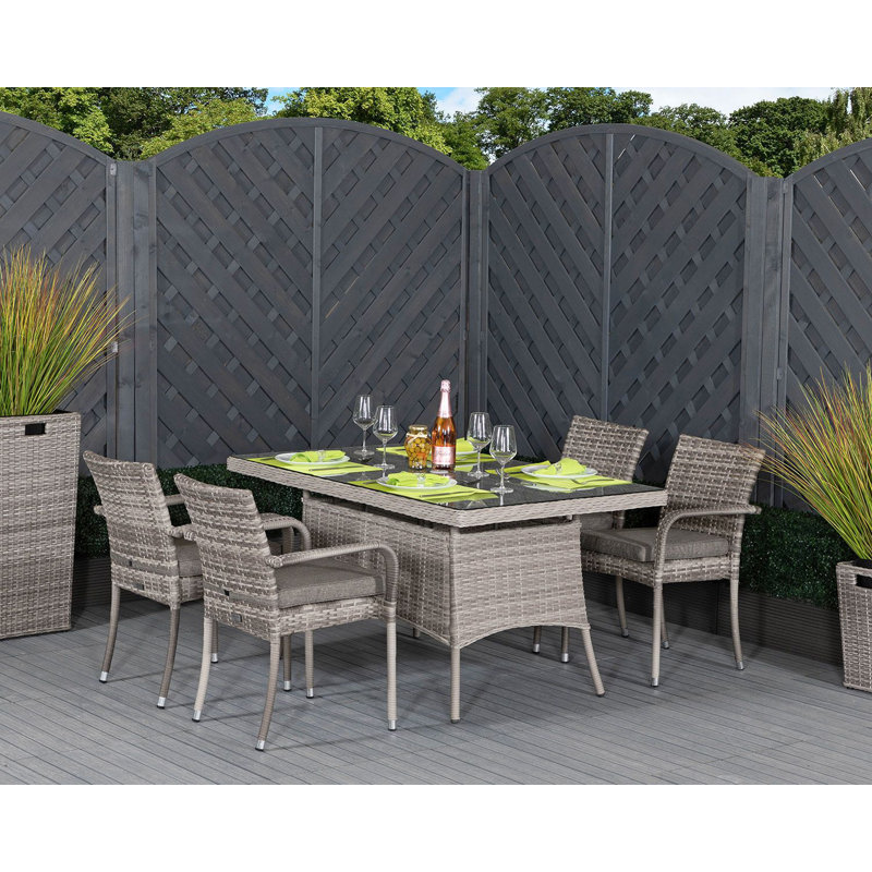 Etheridge 4 - Person Patio Dining Set with Rectangular Table , Cushions Included