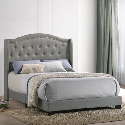 Upholstered Wingback Bed