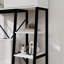 Armoire de rangement de salle de bain au-dessus de la toilette avec porte de grange coulissante
