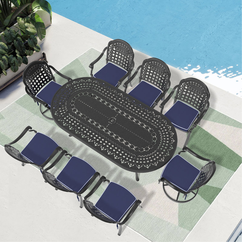 Ensemble de salle à manger 9 pièces en fonte d'aluminium toutes saisons comprenant 2 chaises pivotantes, 6 chaises et une table ovale avec cadre noir