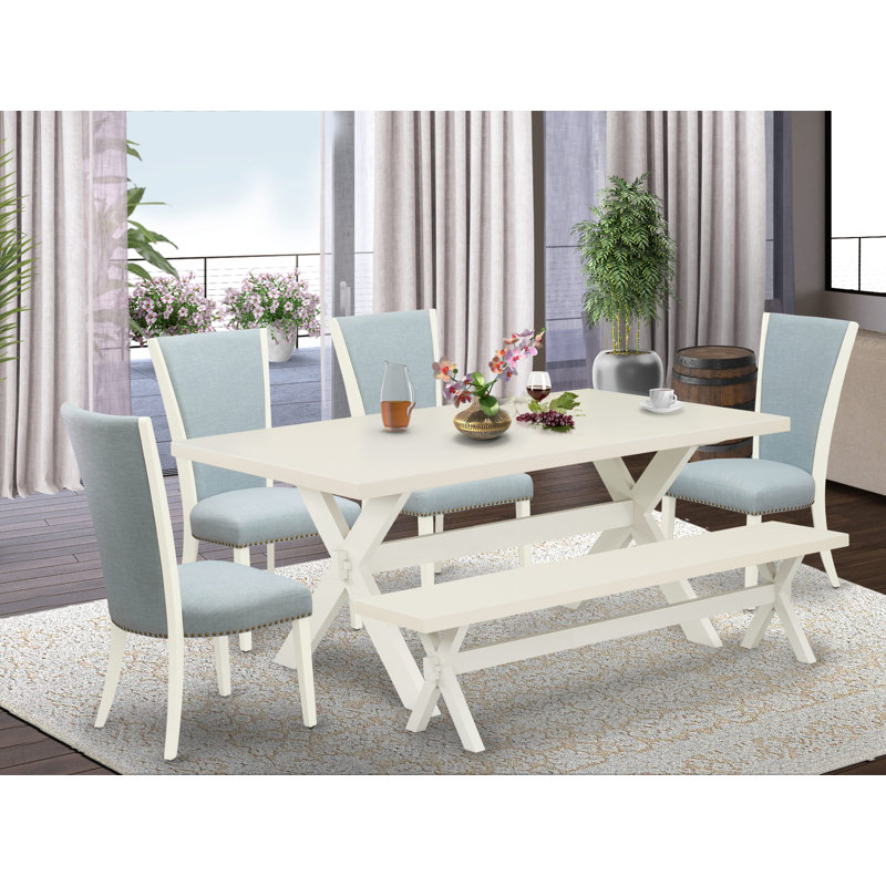 L'ensemble de table de salle à manger 6 pièces contient une table rectangulaire en bois avec des pieds en X et 4 chaises Parson en tissu de lin Gotham foncé avec un banc, finition noire