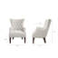 Fauteuil à oreilles capitonné Hannah