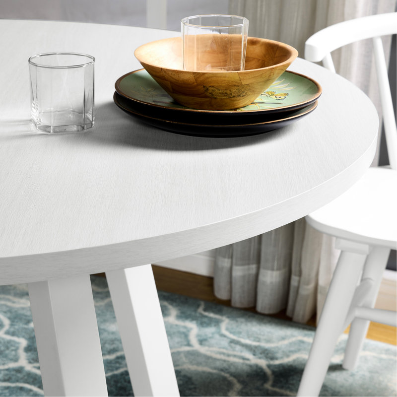 Table de salle à manger contemporaine en blanc avec base en tréteaux et saveur moderne