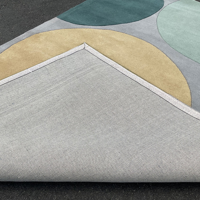 Tapis mauve / bleu / jaune touffeté à la main