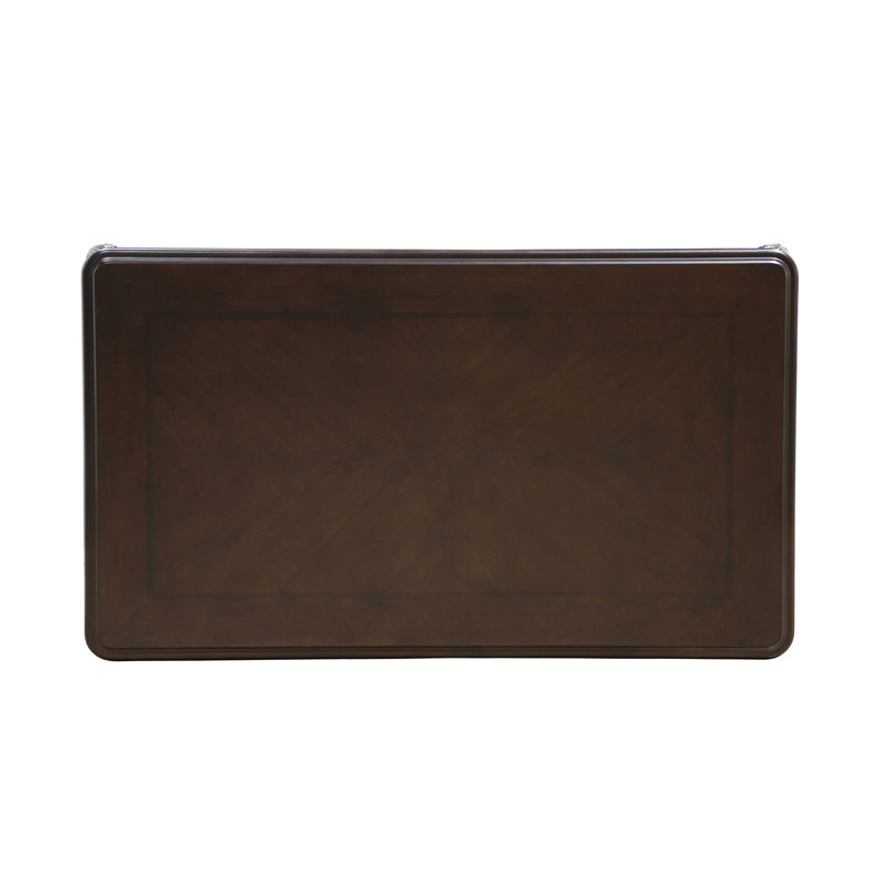 Table basse de style traditionnel avec pieds incurvés, design sculpté, structure en bois massif, finition Java
