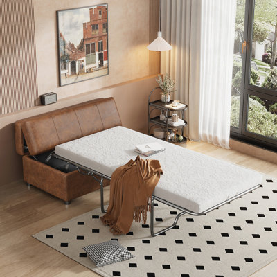 Le lit simple convertible Begley comprend un matelas