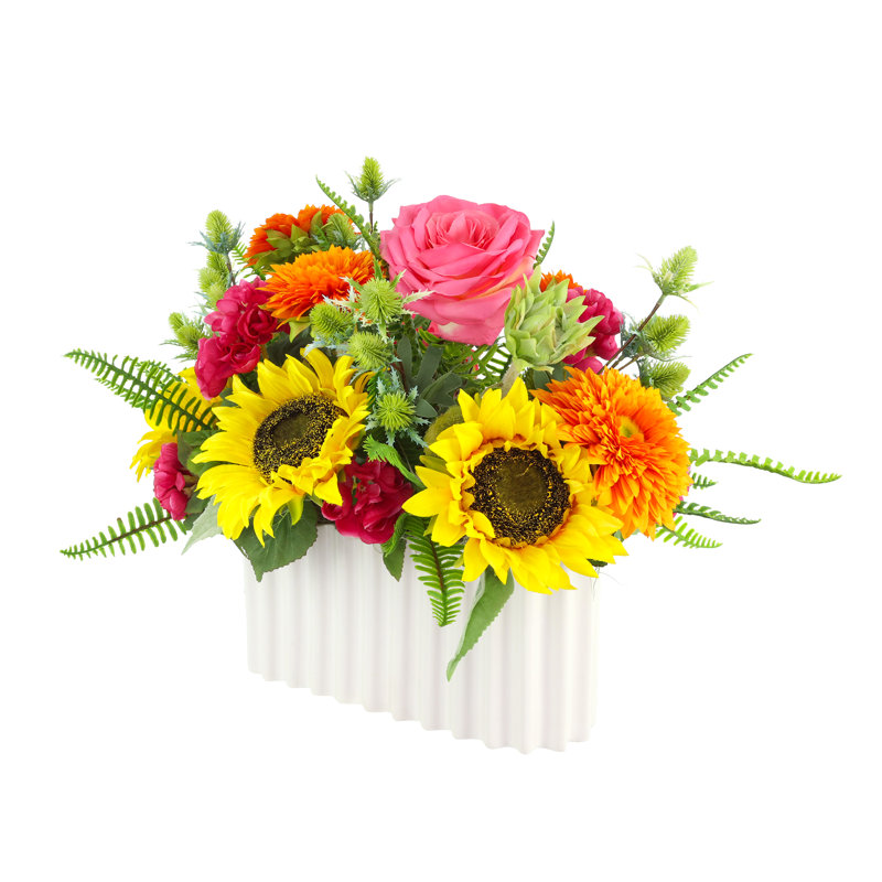 Mélange de fleurs avec des tournesols, des roses et des bégonias