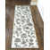 Tapis os à motif floral Ackermanville