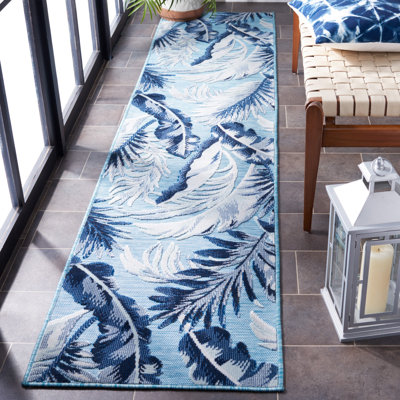 Abbriella Machine Woven Floral Area Rug