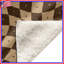 Couvertures ondulées à motif damier-128738997