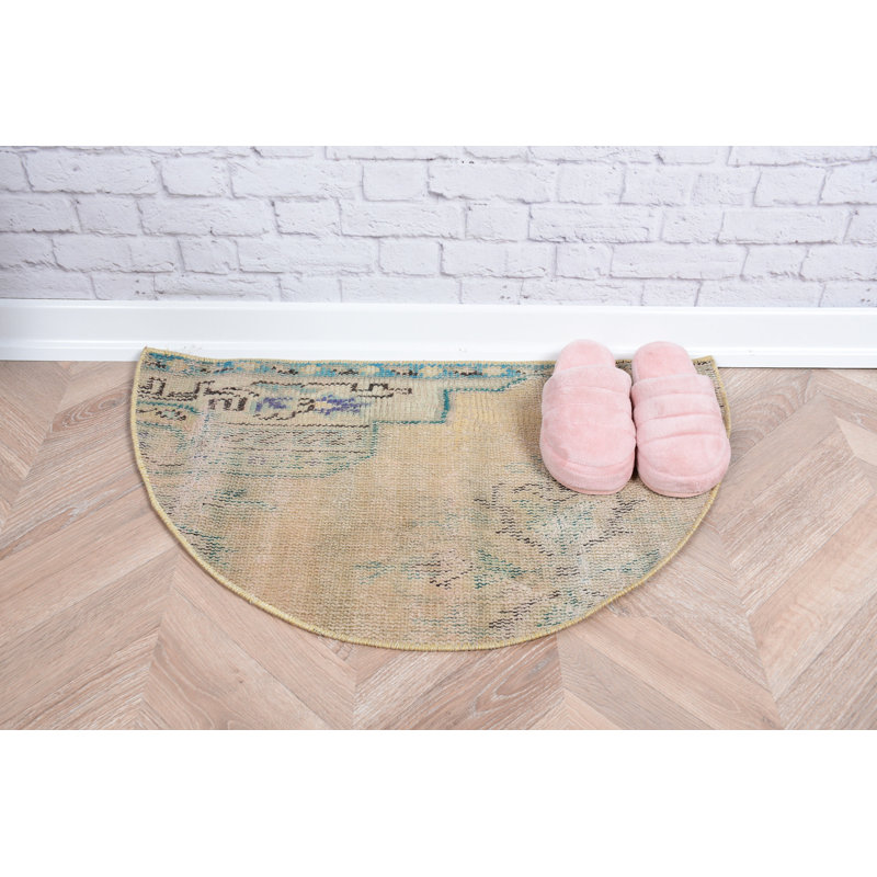 Unique Vintage Turkish Rug in Pastel Tones Featuring Subtle Patterns and Half-Circle Design for Cozy Home