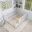 Lit de jour blanc en bois avec couchette et garde-corps