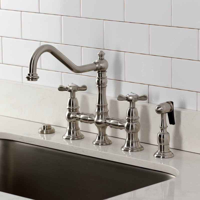 Kingston Brass Essex Two-Handle 4-Hole Deck Mount Bridge Kitchen Faucet With Brass Side Sprayer, Brushed Nickel