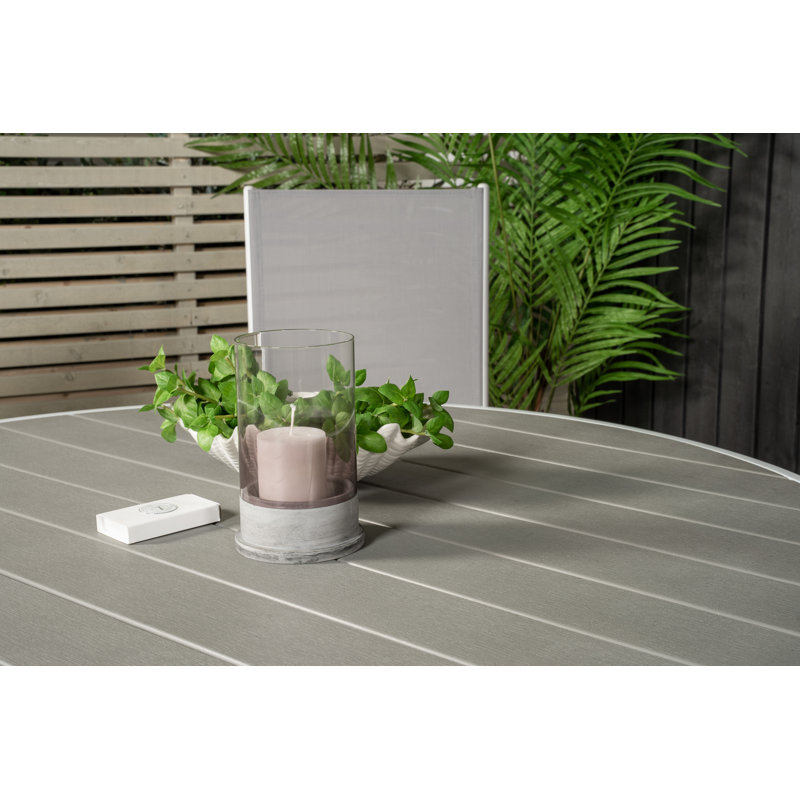 Akia 4 - Person Patio Dining Set Round Table