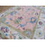 Tapis unique rose 9 pi x 11 pi 9 po