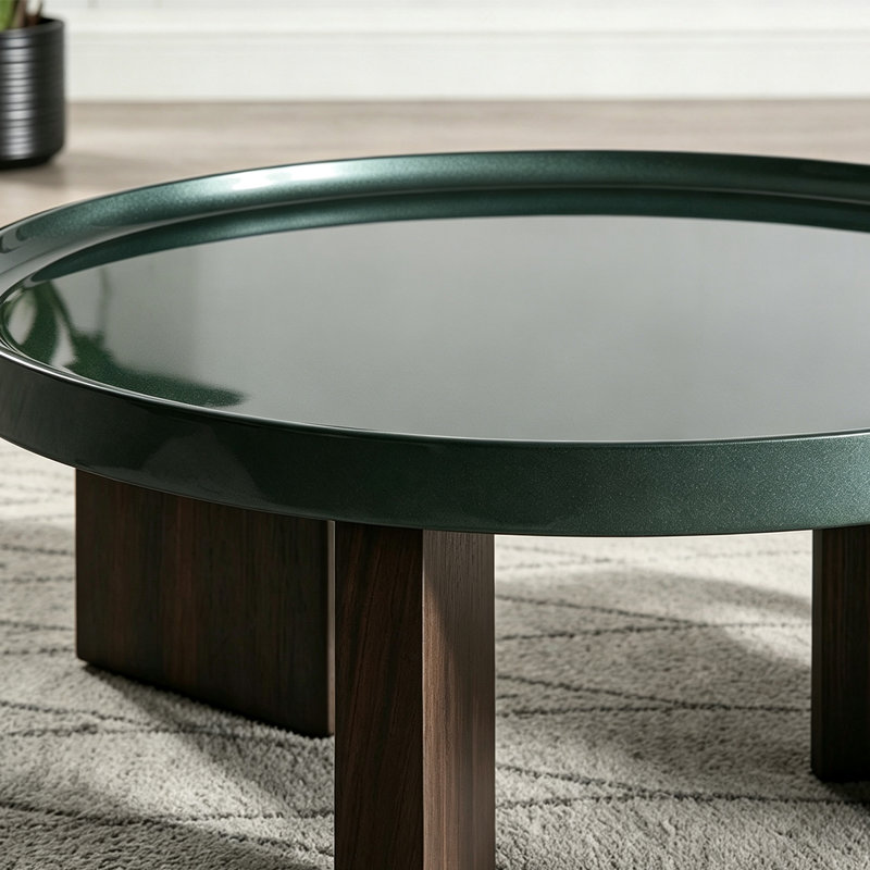 Table basse de style vintage avec plateau noir-vert brillant et pieds en placage chêne blanc