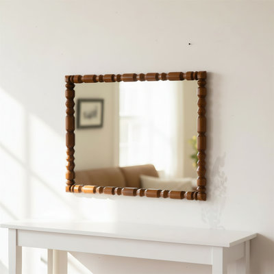 Miroir mural rétro en bois sculpté avec cadre colonne décoratif, adapté aux salons et aux entrées.