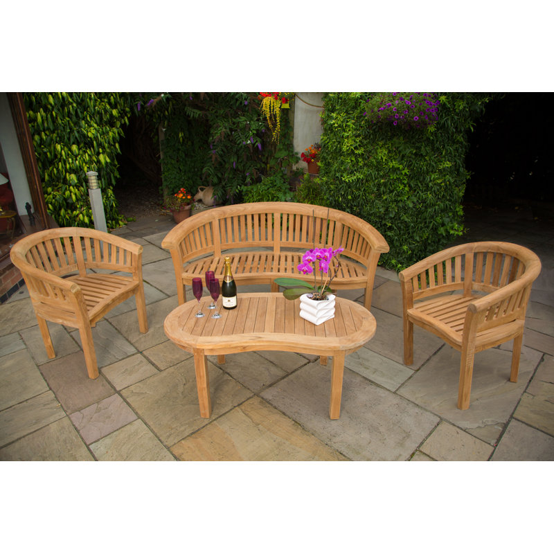 Ganzi 4 - Person Teak Wood Patio Dining Set with Oval Table