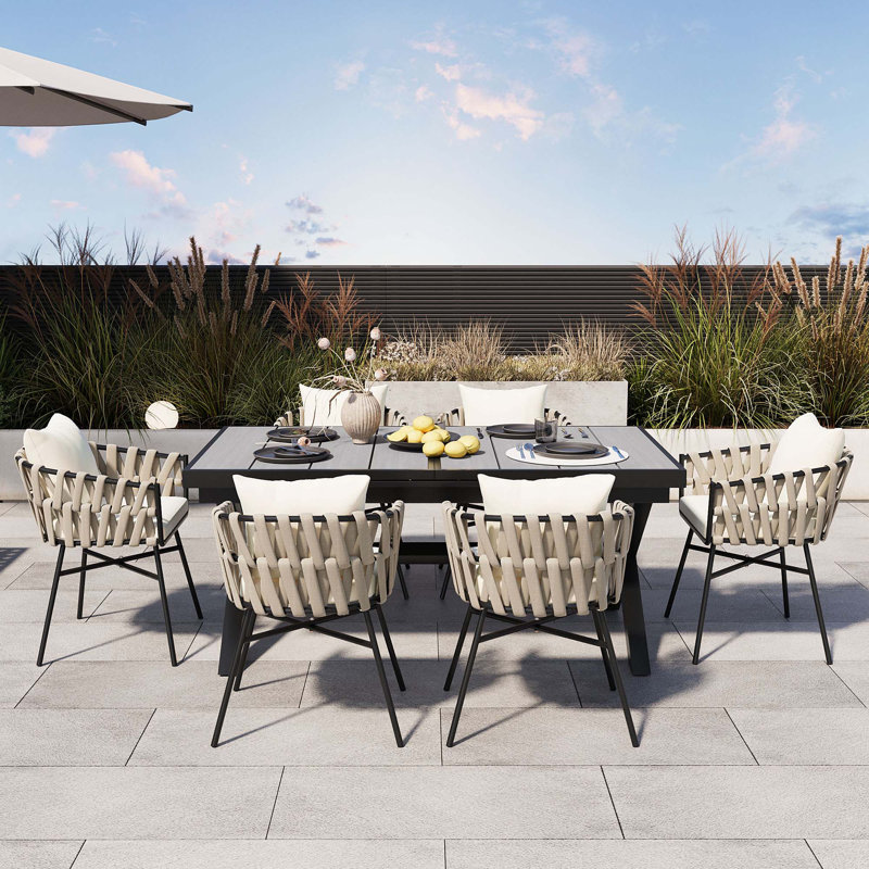 Discover Unmatched Flexibility In Alfresco Dining With Six Creatively Arranged Chairs Made Of Polyester Woven Tape And A Table That Expands From 62.9 To 82.6 Inches To Suit Any Occasion.