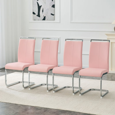 Ensemble de 4 chaises de salle à manger en polyuréthane rose avec pieds en métal argentés incurvés - Chaises à dossier minimalistes modernes pour les salles à manger à la maison.
