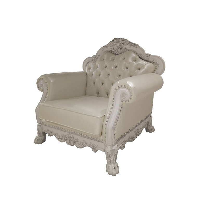 Fauteuil capitonné et demi Luyn