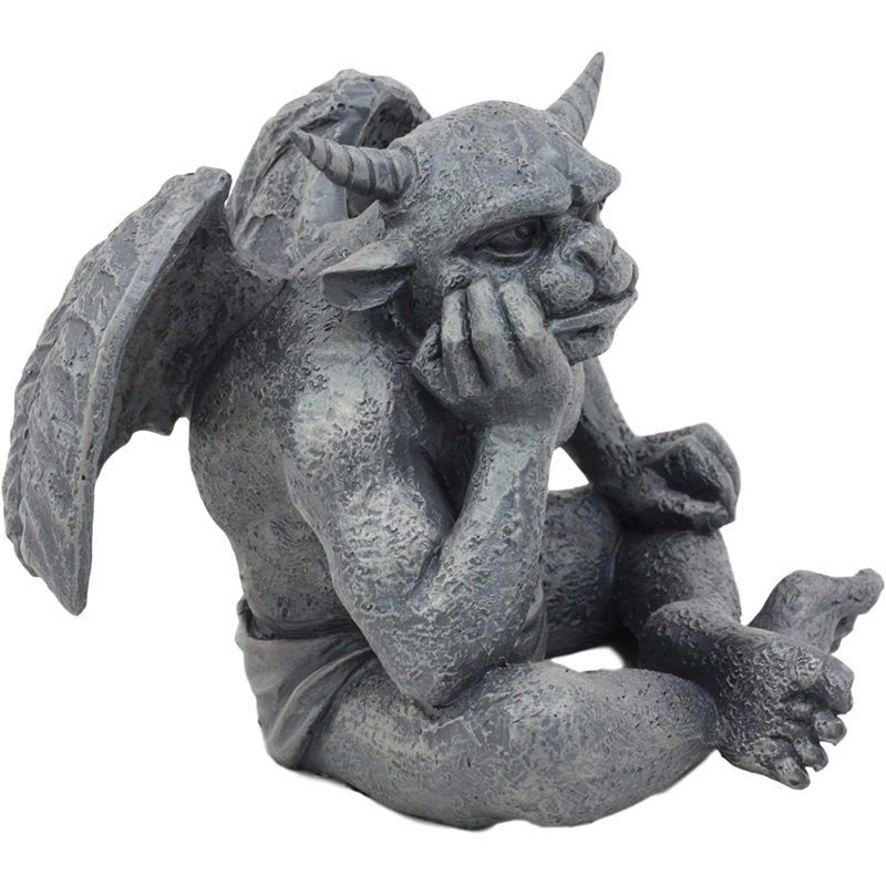 Figurine Devian le rêveur assis