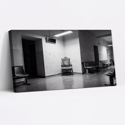 Black and White Vintage Armchair in Waiting Room Canvas Wall Art