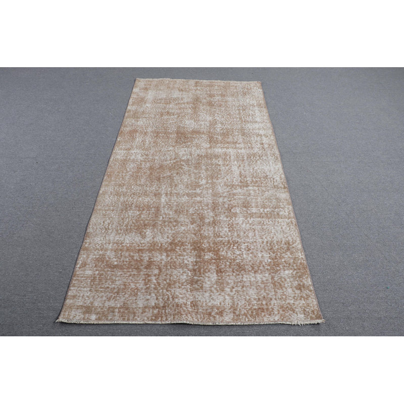 Tapis turc d'inspiration rétro pour une utilisation en salon avec des caractéristiques douces et lavables en brun