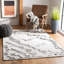 Tapis abstrait en viscose / cuir / coton touffeté à la main Jarrell-626712317