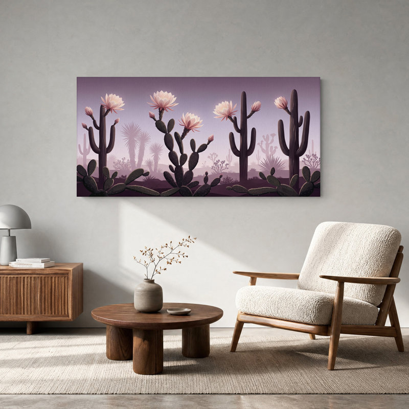 Tableau sur toile représentant des cactus roses en fleurs sur fond de ciel violet, L 40 po x H 20 po