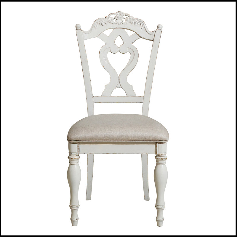 Élégante chaise d'appoint rembourrée avec coussin moelleux, parfaite pour les expériences culinaires confortables et élégantes.
