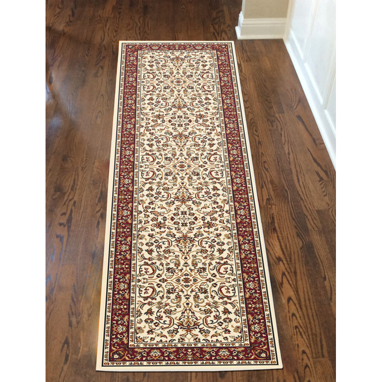 Tapis ivoire à motif floral
