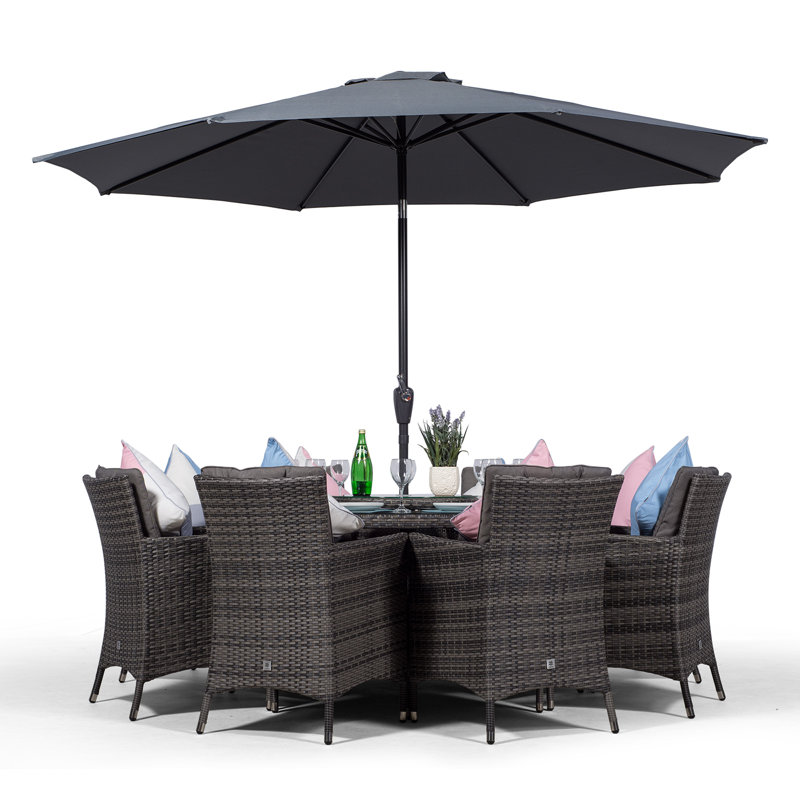 Karcher 8 - Person Wicker Patio Dining Set with Round Table , Cushions Included