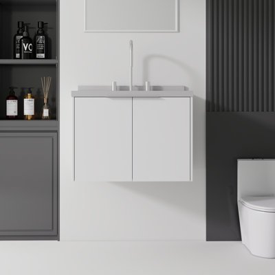 Meuble-lavabo suspendu de 61 cm (24 po) avec comptoir et dosseret en marbre reconstitué, armoire en contreplaqué, lavabo en céramique, portes à fermeture amortie, blanc