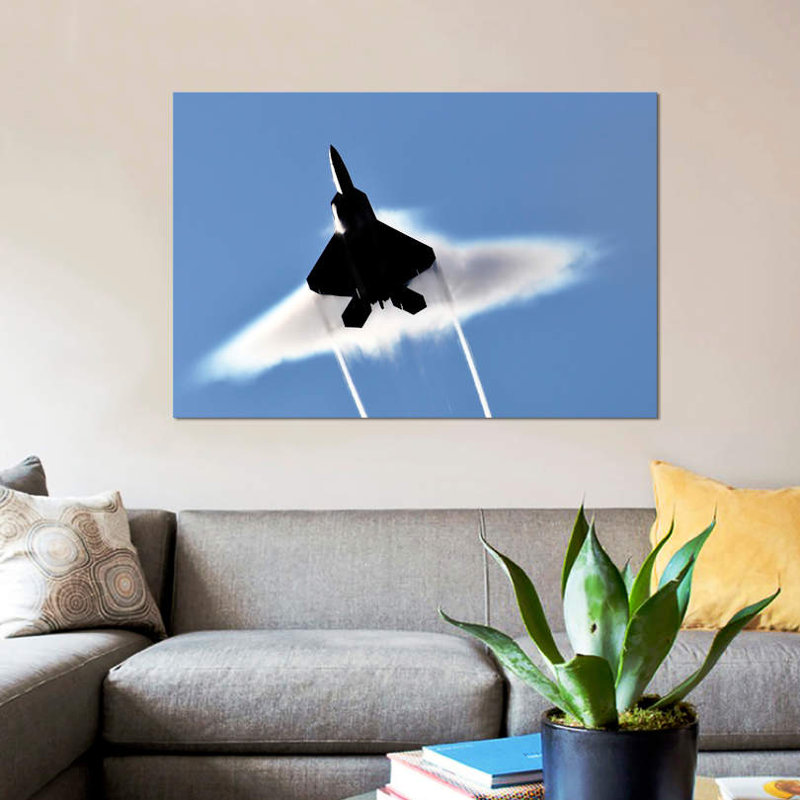 A US Air Force F-22 Raptor Aircraft Executing A Supersonic Flyby by Stocktrek Images - Gallery-Wrapped Canvas Giclée on Canvas