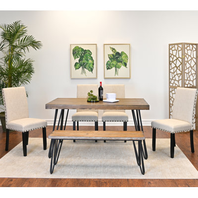 Ensemble de table de salle à manger six pièces pour les réunions de famille, idéal pour les espaces compacts avec un design moderne et des sièges confortables