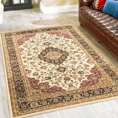 Tapis crème classique en polypropylène de 10 pi 6 po x 14 pi avec motif médaillon d'apparence et d'aspect élégant
