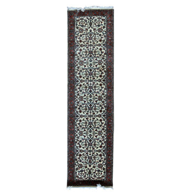 Tapis de couloir oriental ivoire / vert / rouge en laine noué à la main 2 pi 6 po x 9 pi 9 po