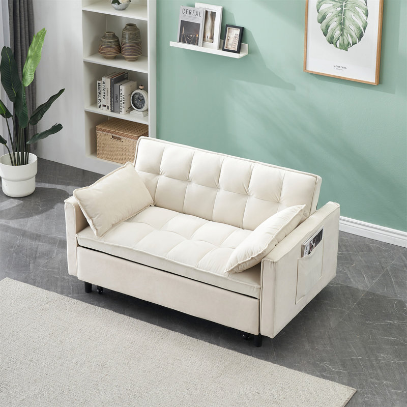 Canapé convertible moderne avec lit escamotable, poches intégrées et dossier incurvé ergonomique pour les petits espaces.